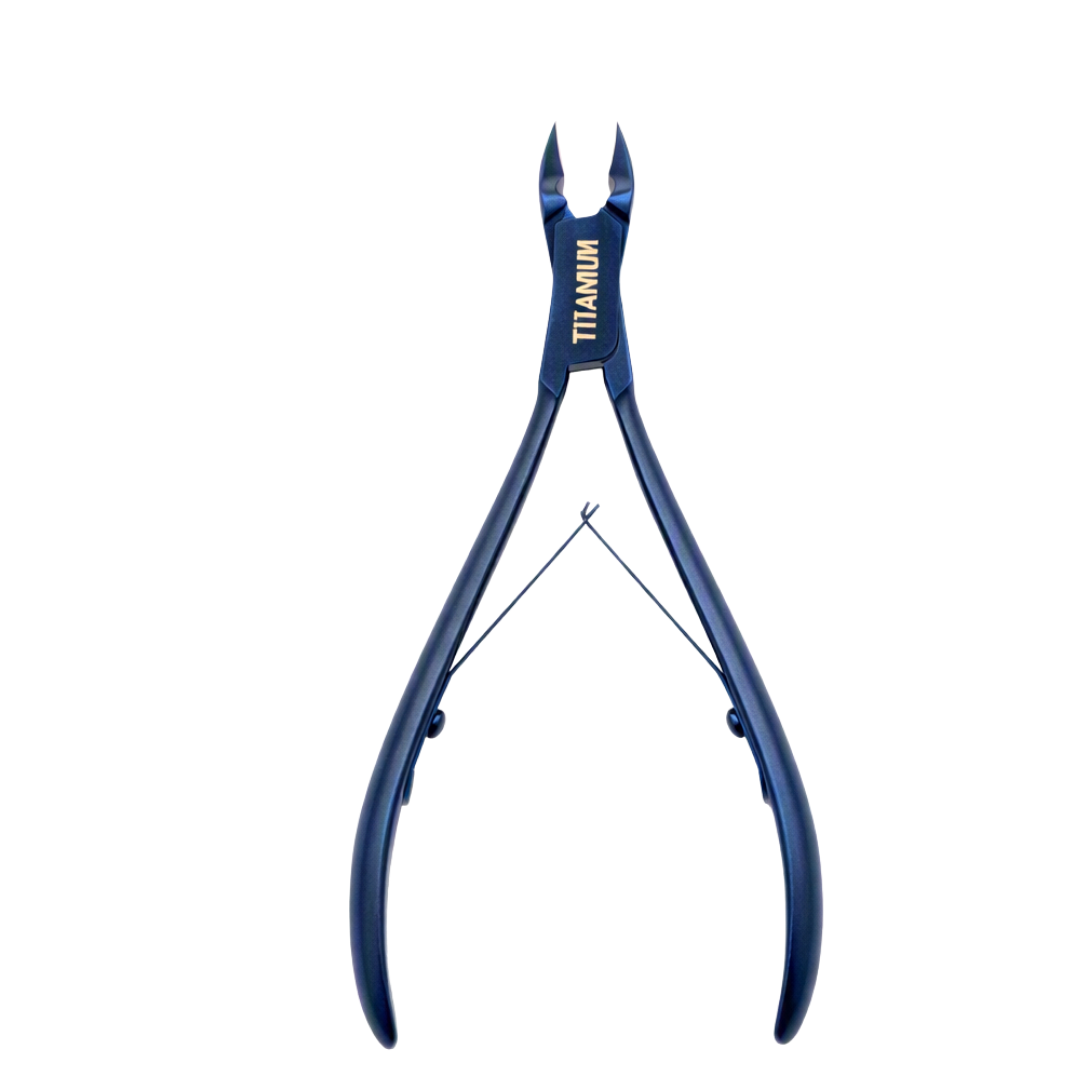 Titanium cuticle cutter nipper with blue handles and gold lettering, shown against a solid white background.