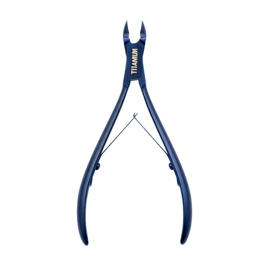 A pair of titanium cuticle cutter nippers with dark blue handles and gold 'TITANIUM' lettering, shown against a solid white background.