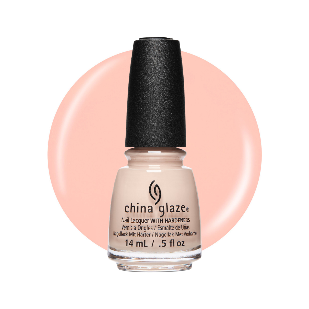 A bottle of China Glaze nail polish with a black cap, shown against a white background with a large peach-pink circular color swatch behind it. The bottle label reads 'china glaze' and 'Nail Lacquer with Hardeners'.