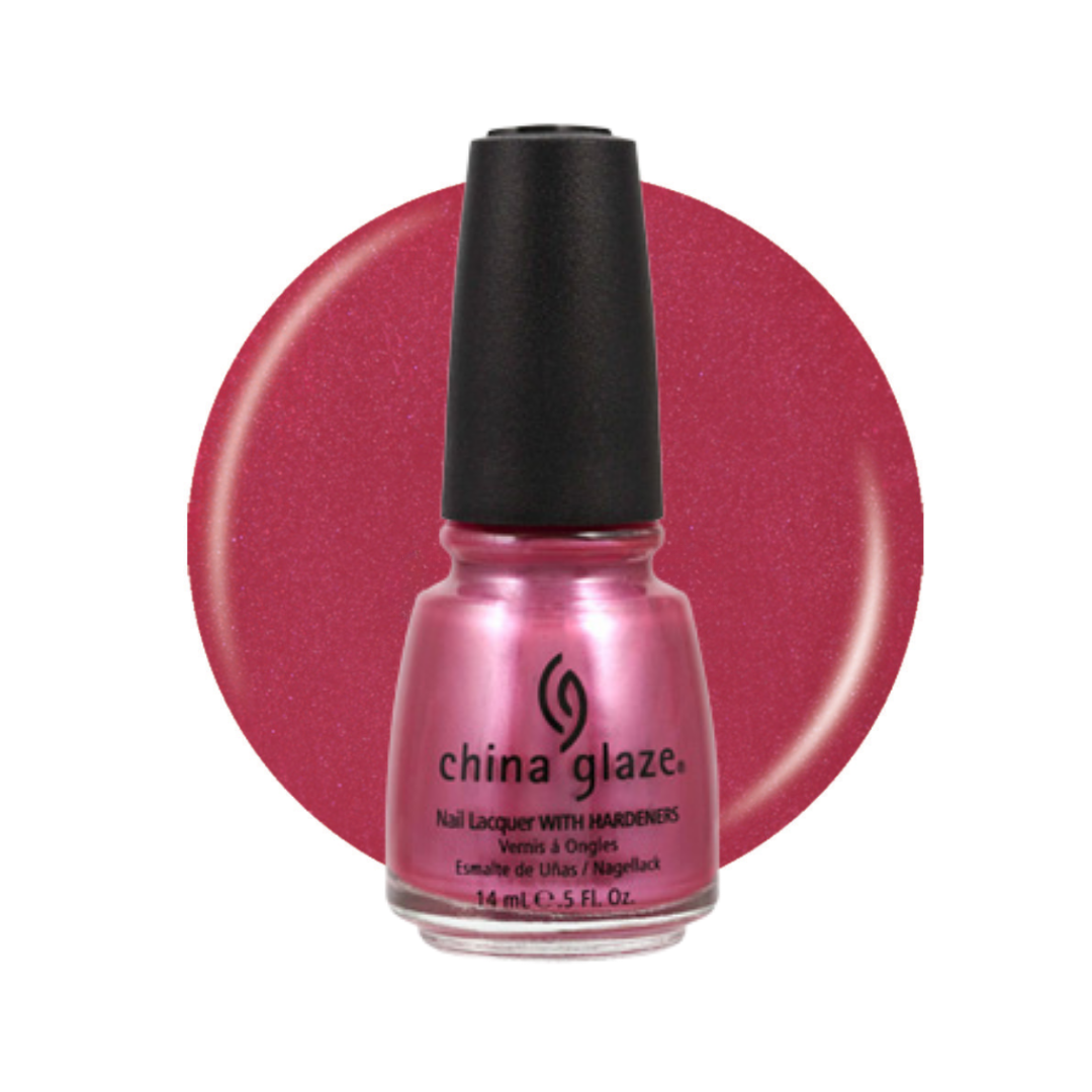 A bottle of China Glaze nail polish in a shimmering metallic pink shade, set against a matching circular color swatch on a white background.