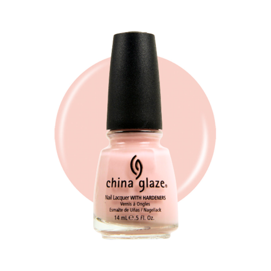 A bottle of China Glaze nail polish in a light pink color visible through the clear glass bottle and a black cap, set against a white background with a soft pink circular color swatch behind it.