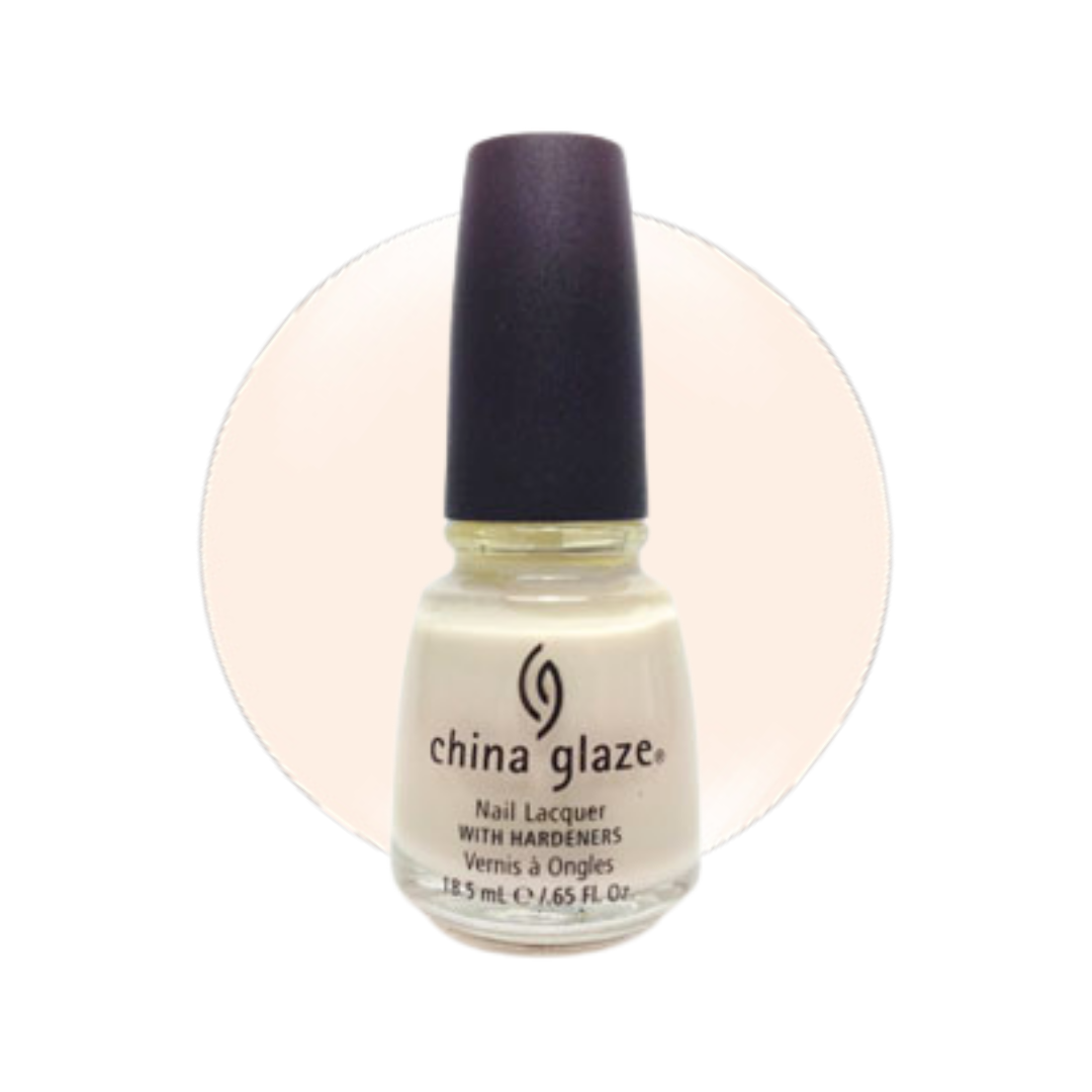 A bottle of China Glaze nail polish with a black cap, shown against a white background with a pale peach circular color swatch behind it.