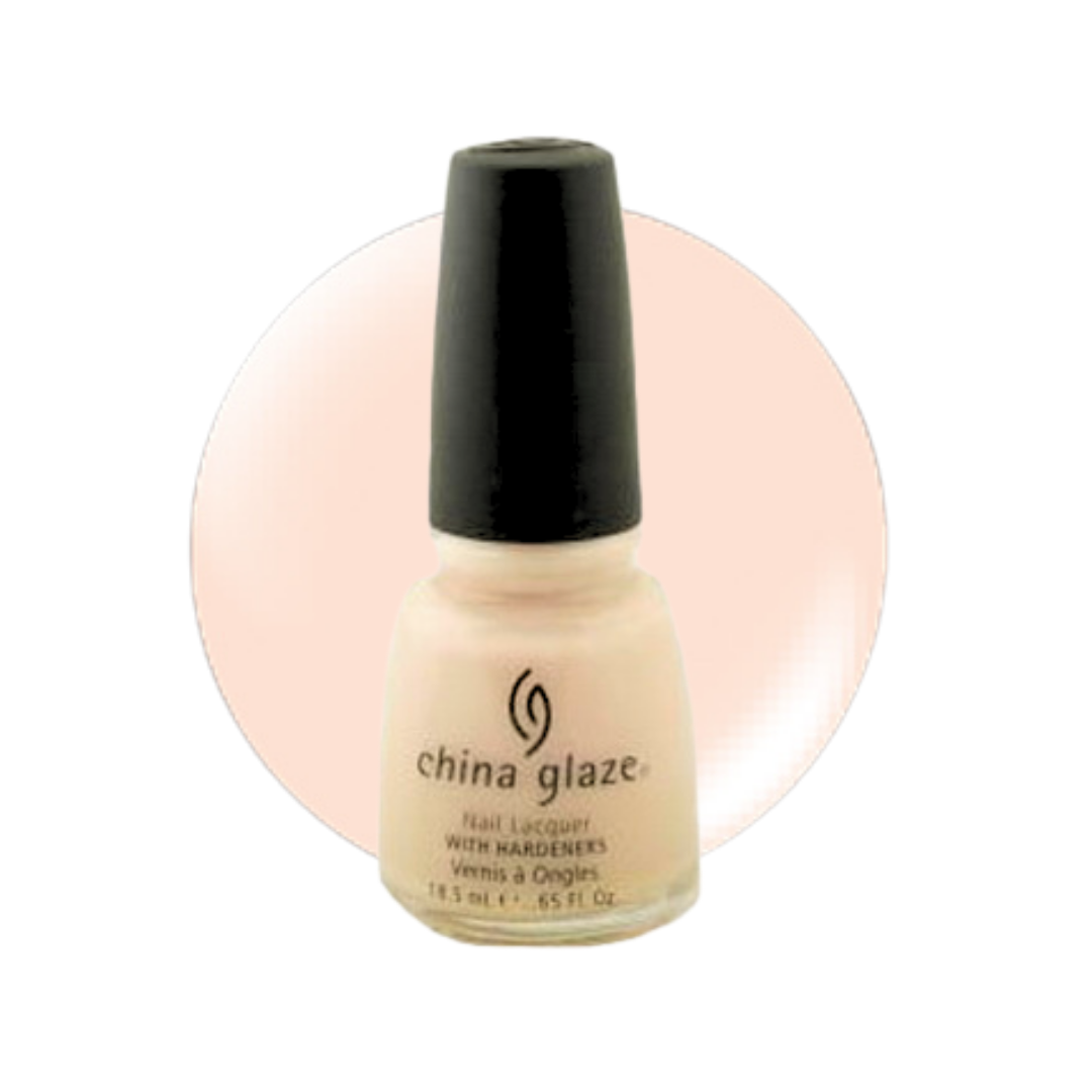 A bottle of China Glaze nail polish with a black cap, shown against a white background with a soft peach circular color swatch behind it.