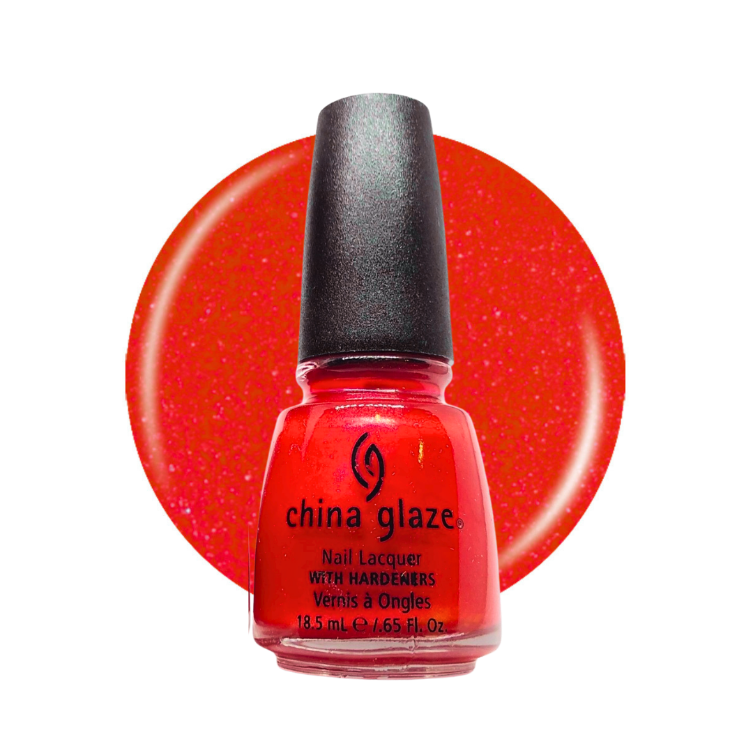 A bottle of China Glaze nail lacquer in a bright red-orange glitter shade, shown in front of a matching circular color swatch on a white background.