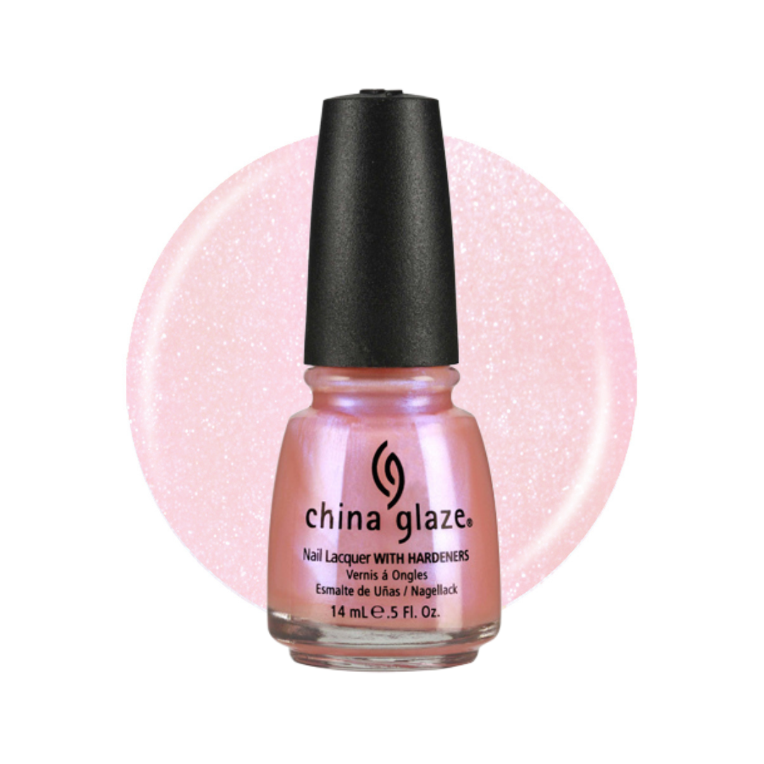 A bottle of China Glaze nail polish with a black cap, showing a light pink glitter polish inside a clear glass bottle, set against a matching pink glitter circular swatch on a white background.