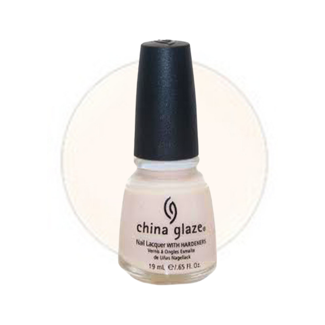 A bottle of China Glaze nail polish in a light warm beige shade, featuring a black cap and a circular beige swatch behind it on a white background.