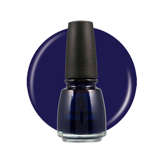 A bottle of China Glaze nail polish in a deep navy-blue shade, shown in front of a matching navy-blue circular color swatch on a white background.