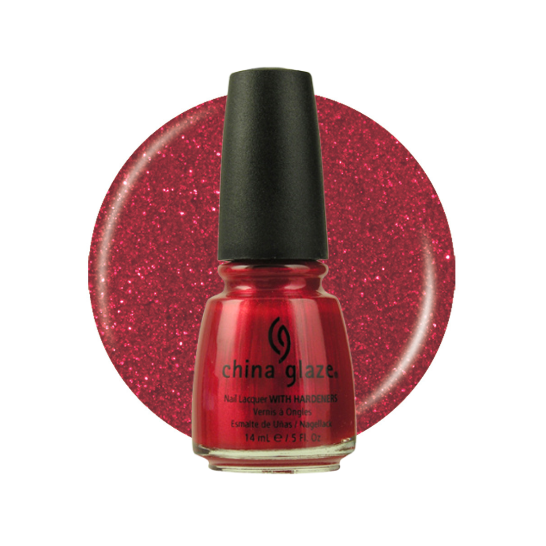 A bottle of China Glaze nail polish with a black cap, shown in front of a circular glitter swatch of the same red-pink shade on a white background.