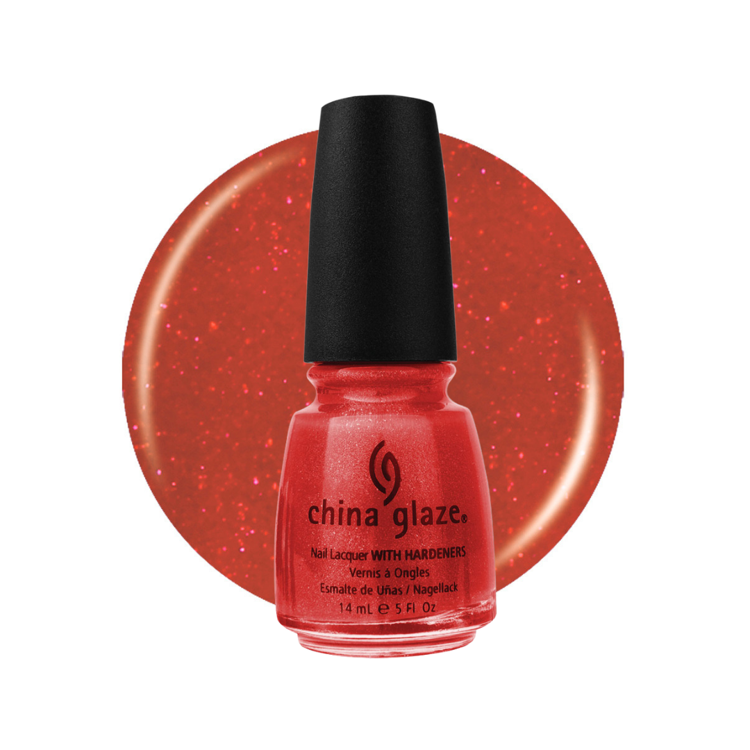 A bottle of China Glaze nail lacquer with hardeners in a shimmering coral-red shade, shown in front of a matching circular color swatch on a white background.