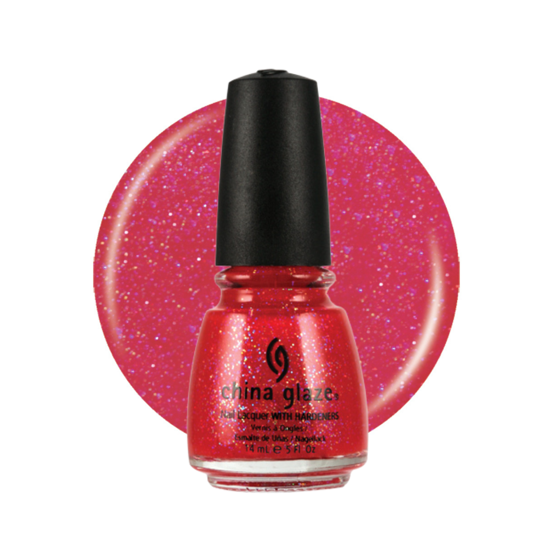 A bottle of China Glaze nail polish with a black cap, shown in front of a large circular swatch of the glittery pink-red polish color on a white background.
