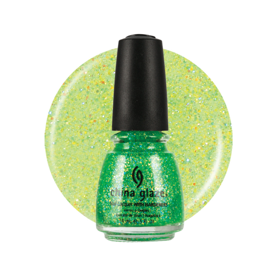 A bottle of China Glaze nail polish in a bright green shade with fine gold glitter, shown in front of a circular swatch of the same glittery green polish on a white background.