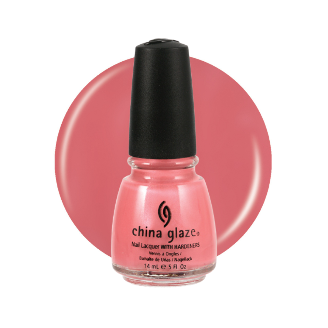 A bottle of China Glaze nail polish in a coral pink shade, shown in front of a matching circular color swatch on a white background.