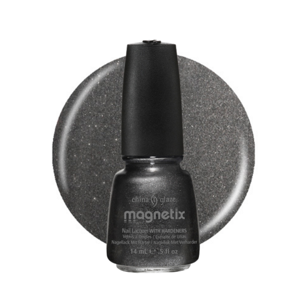 A bottle of China Glaze Magnetix nail polish in a dark gray glitter shade, shown in front of a matching circular swatch on a white background.