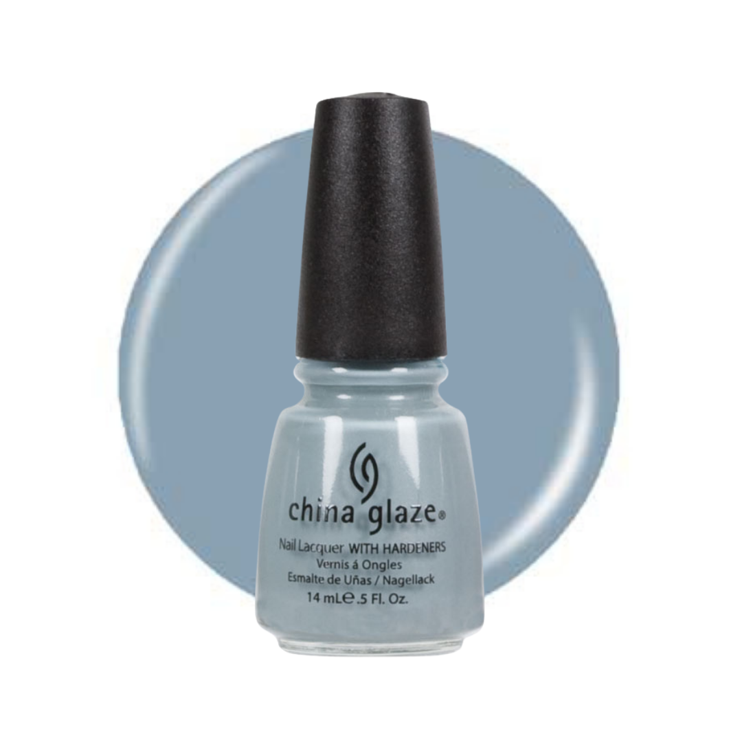 A bottle of China Glaze nail polish with hardeners in a dusty light blue-gray shade, shown in front of a matching circular color swatch on a white background.