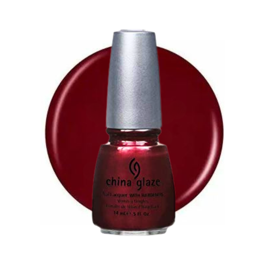 A bottle of China Glaze nail polish in a deep metallic burgundy red shade, shown in front of a matching circular color swatch on a white background.