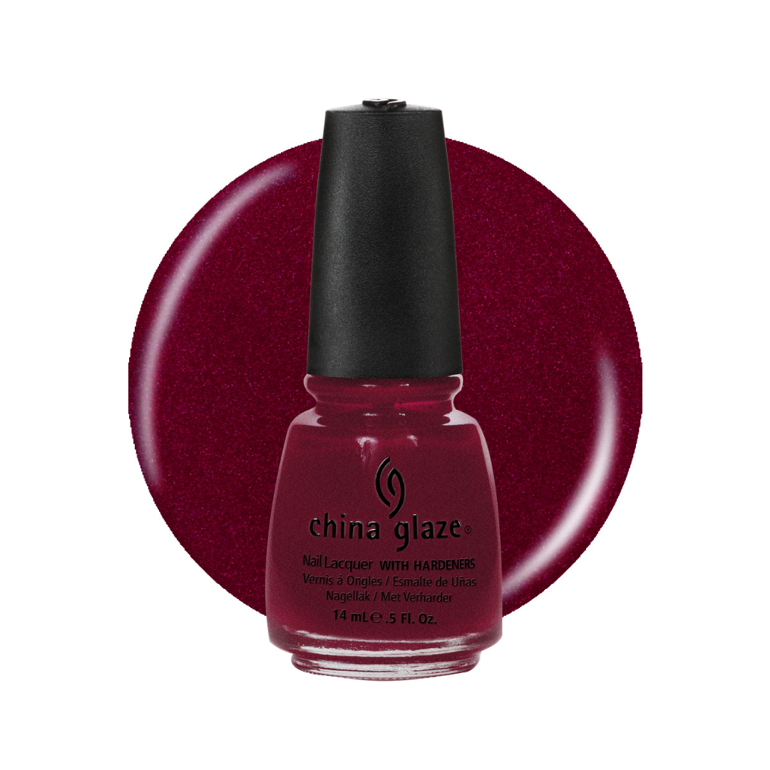 A bottle of China Glaze nail polish with hardeners, shown in front of a large circular color swatch of the same deep berry red shade on a white background.