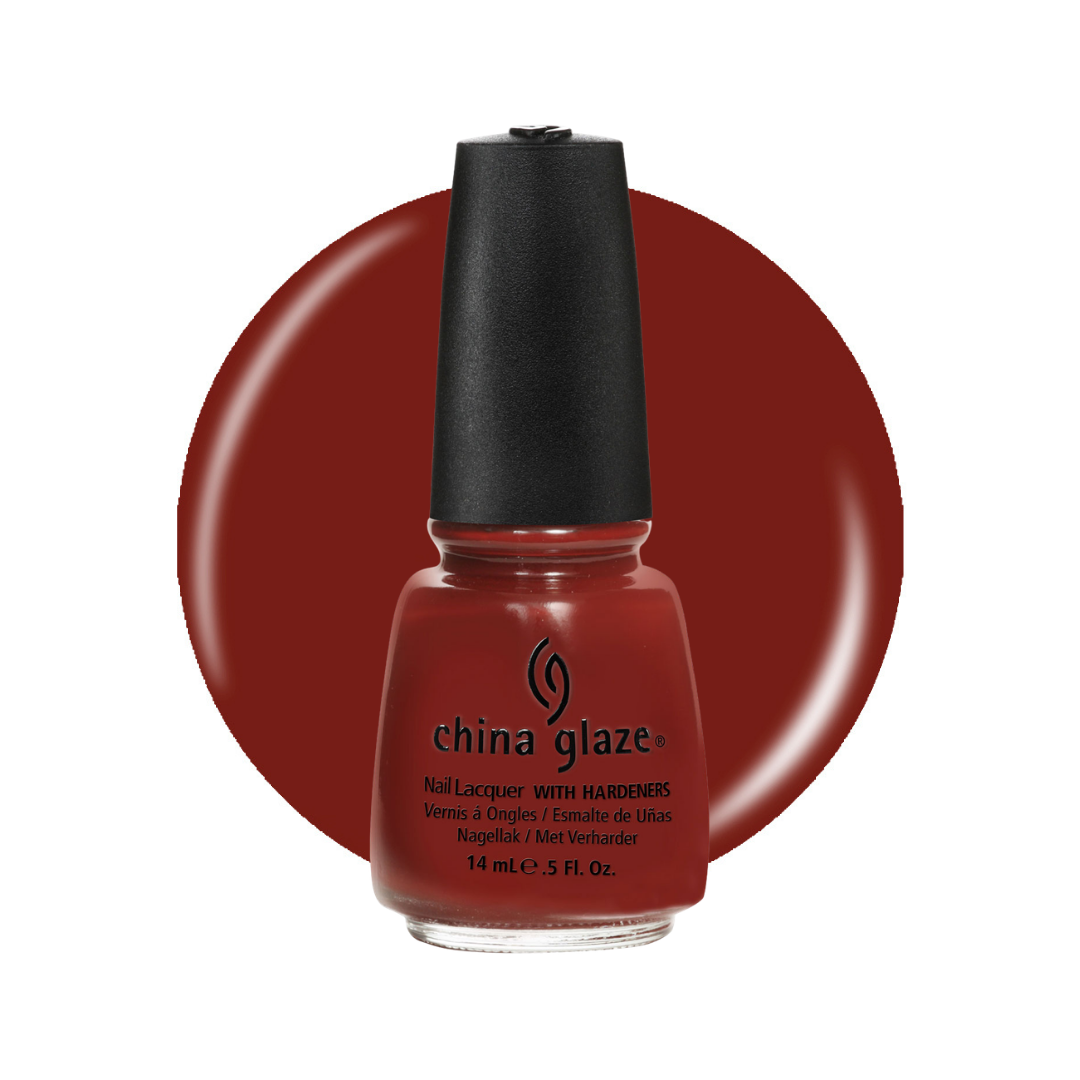 A bottle of China Glaze nail lacquer in a deep brick red shade, set against a matching circular color swatch on a white background.