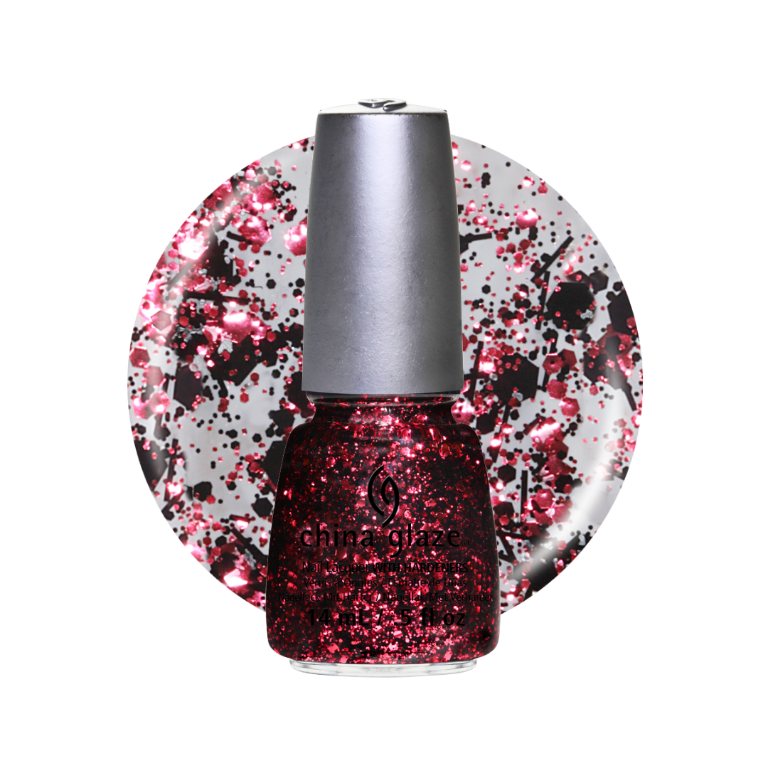A bottle of China Glaze black and red glitter nail polish with a silver cap, shown in front of a circular swatch of multicolor glitter on a white background.