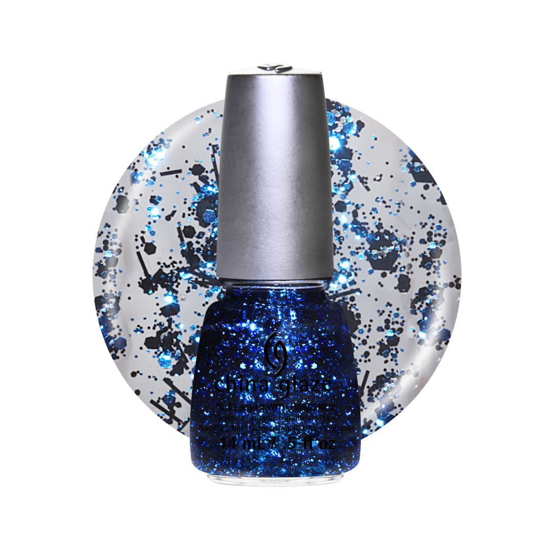 A bottle of China Glaze nail polish in a sparkling royal blue shade, displayed in front of a circular white background swatch filled with blue and black glitter splatters.