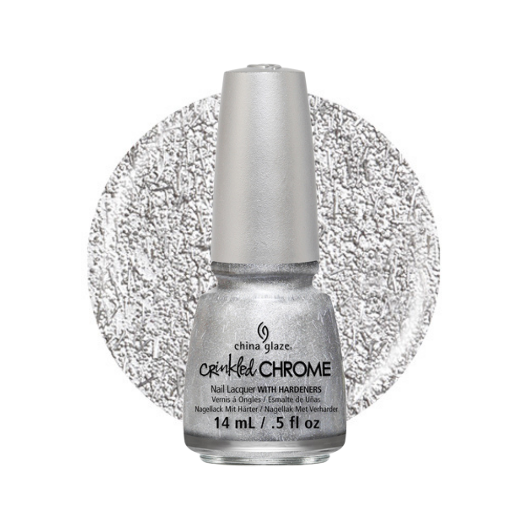 A bottle of China Glaze Crinkle Chrome nail polish in a shimmering silver color, shown in front of a circular glitter swatch of the same silver shade on a white background.