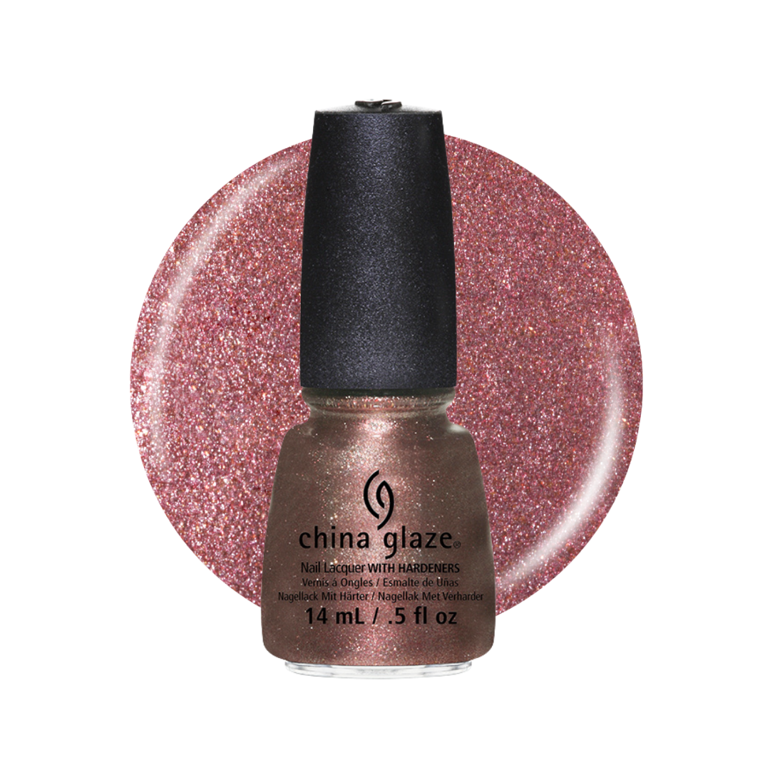 A bottle of China Glaze nail polish with a black cap, shown in front of a circular glitter swatch of the same dusty rose-gold shade on a white background.