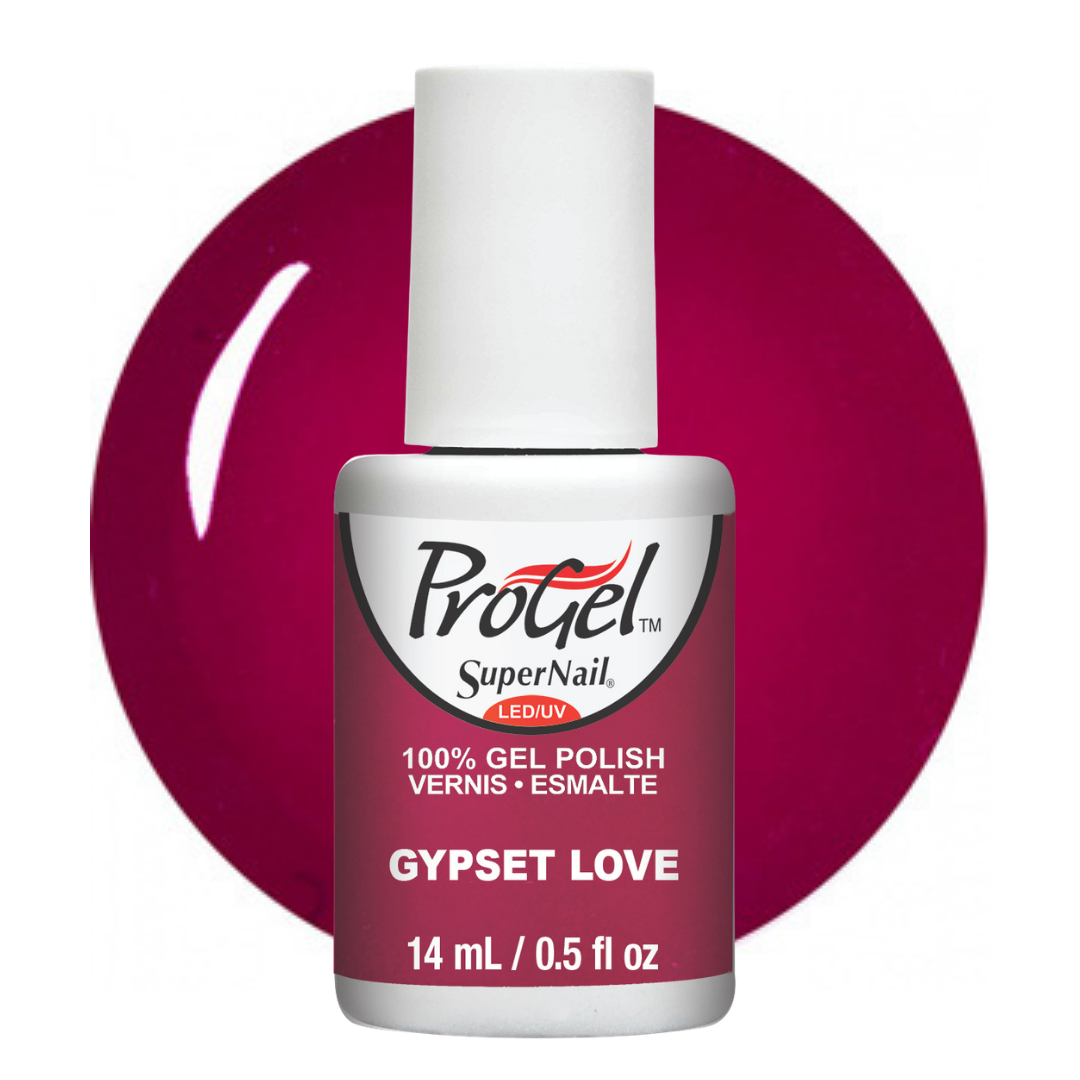 A bottle of ProGel SuperNail LED UV gel polish in the shade Gypsy Love, featuring a white cap and a magenta-pink label, set against a matching magenta-pink circular background on a white studio backdrop.