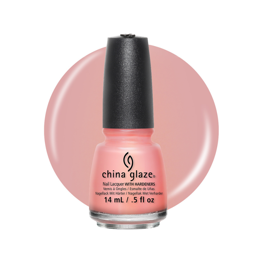 A bottle of China Glaze nail polish with hardeners in a soft pink shade, shown against a white background with a large matching pink color circle behind it.
