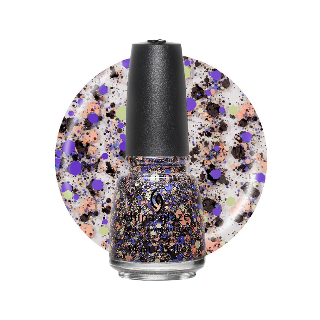 A bottle of China Glaze nail polish with a black cap, filled with a glittery multicolor polish featuring purple, gold, and black flecks on a white base. A circular swatch of the same glitter pattern is displayed behind the bottle against a white background.