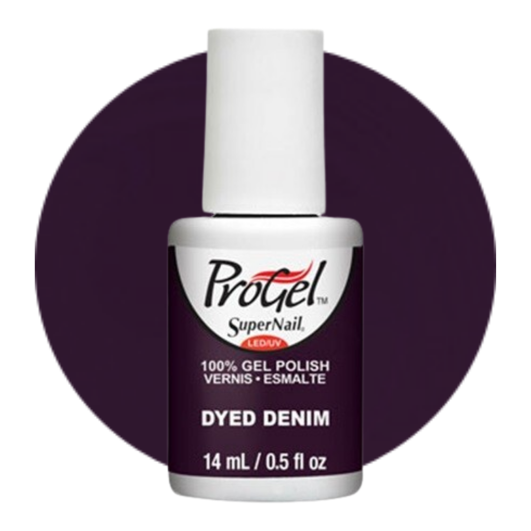 A bottle of ProGel SuperNail LED gel polish in the shade 'Dyed Denim', featuring a white cap and a white label with dark purple text, set against a matching dark purple circular background.