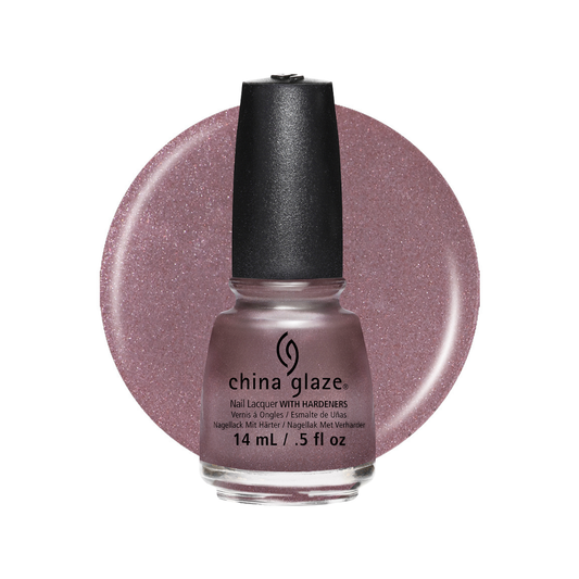 A bottle of China Glaze nail polish in a shimmering dusty mauve-pink shade, shown in front of a matching circular color swatch on a white background.