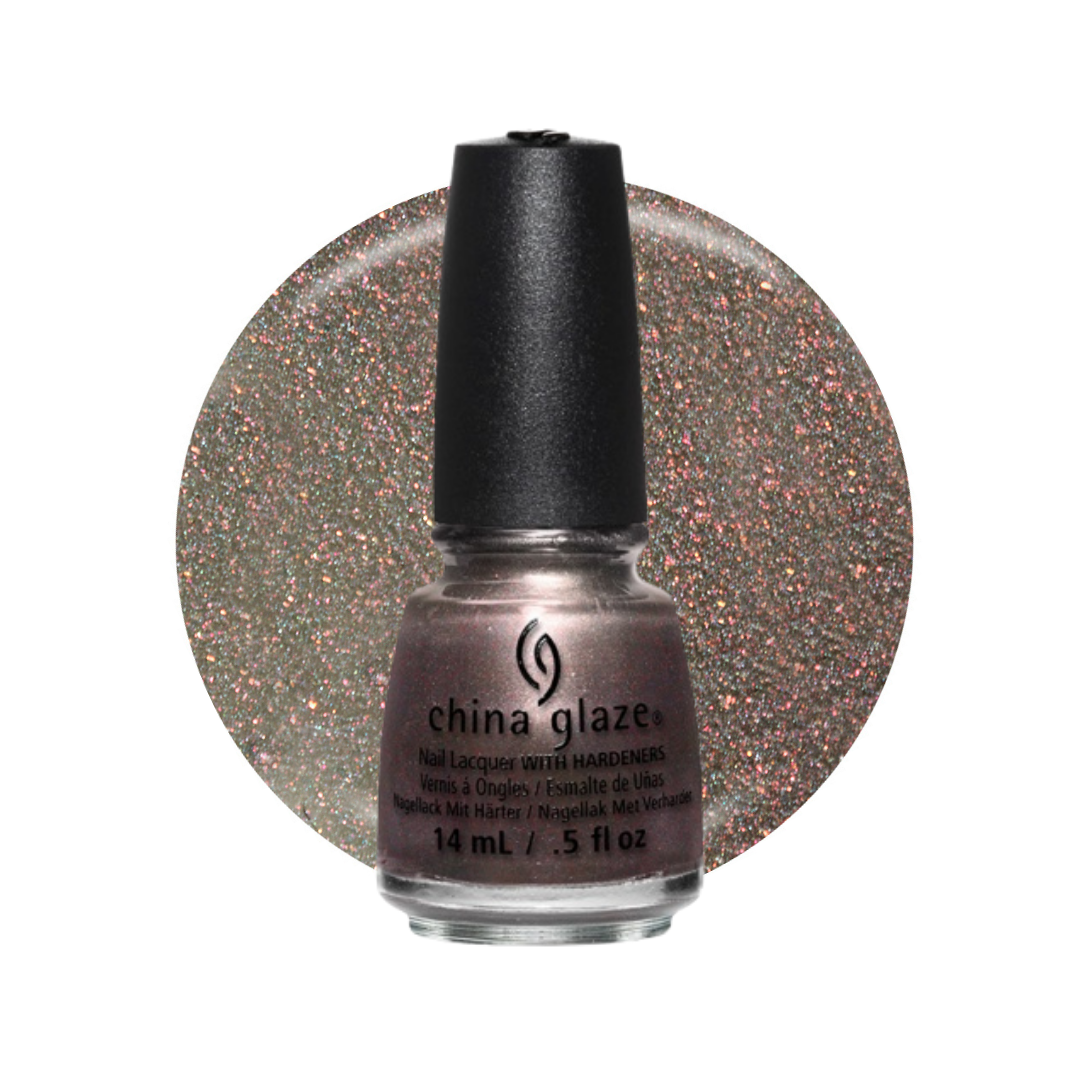 A bottle of China Glaze nail polish in a shimmery bronze-gold shade, presented in front of a circular color swatch showing the glittery finish.