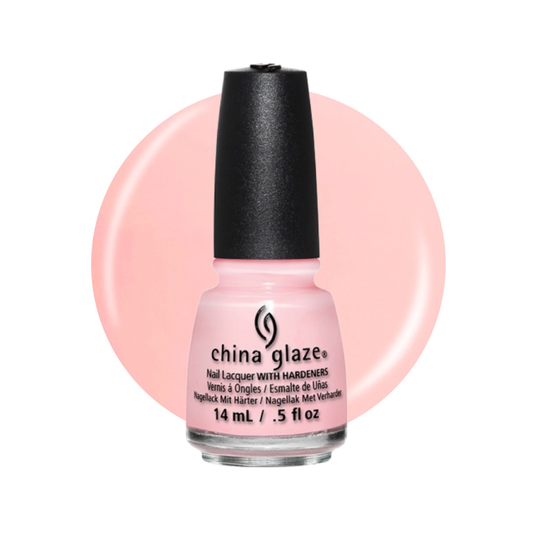 A bottle of China Glaze nail polish with a black cap and light pink lacquer, shown in front of a large pale pink circular color swatch on a white background.