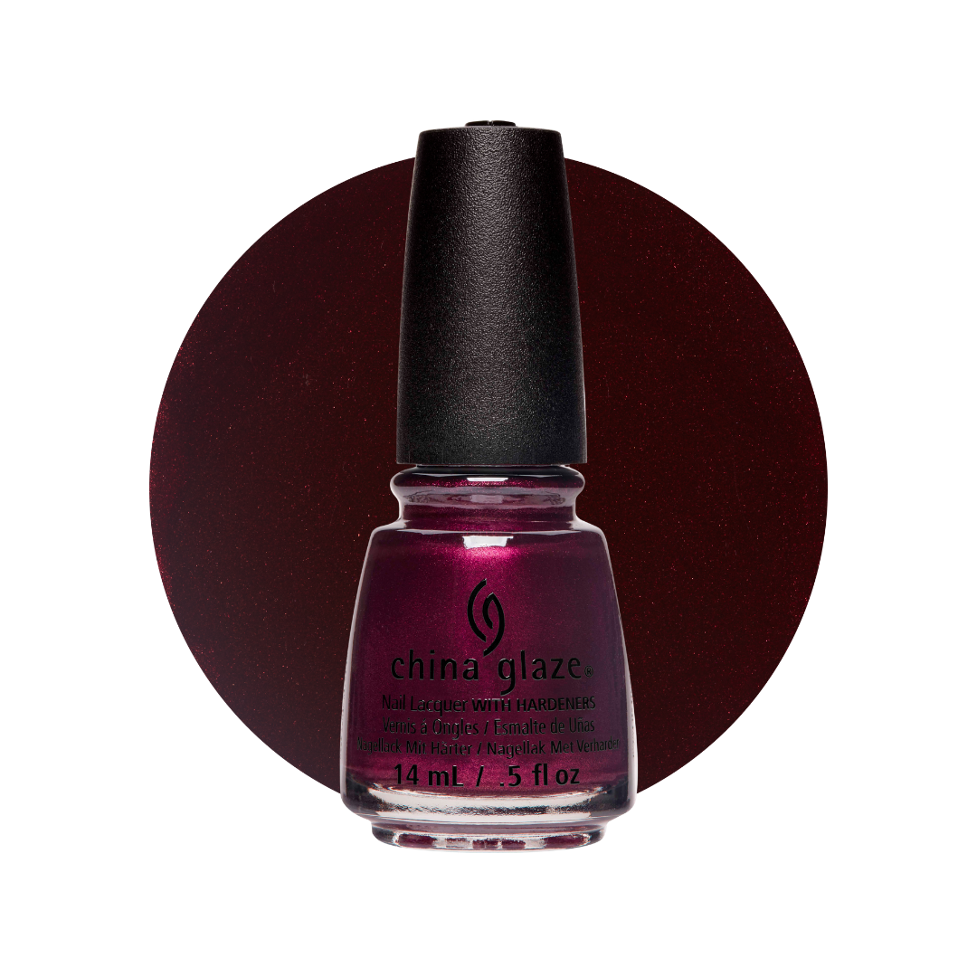 A bottle of China Glaze nail polish in a deep burgundy shade, shown against a white background with a matching circular color swatch behind it.