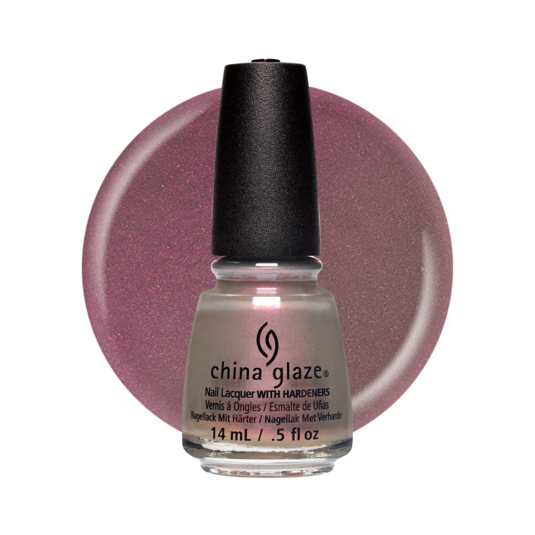 A bottle of China Glaze nail polish with a black cap, shown in front of a circular swatch of the glittery mauve-pink polish color on a white background.