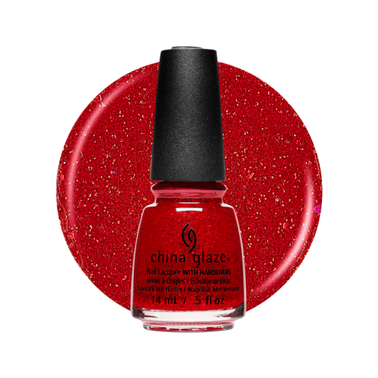 A bottle of China Glaze nail polish with a black cap, shown in front of a large glittery red circular swatch on a white background.