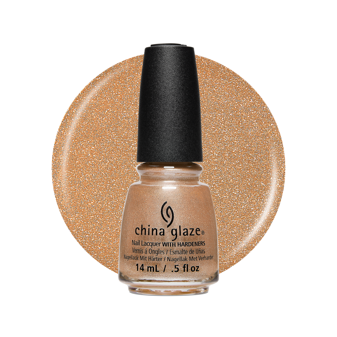 A bottle of China Glaze nail polish with hardeners in a glittery champagne-gold shade, shown in front of a matching circular swatch on a white background.
