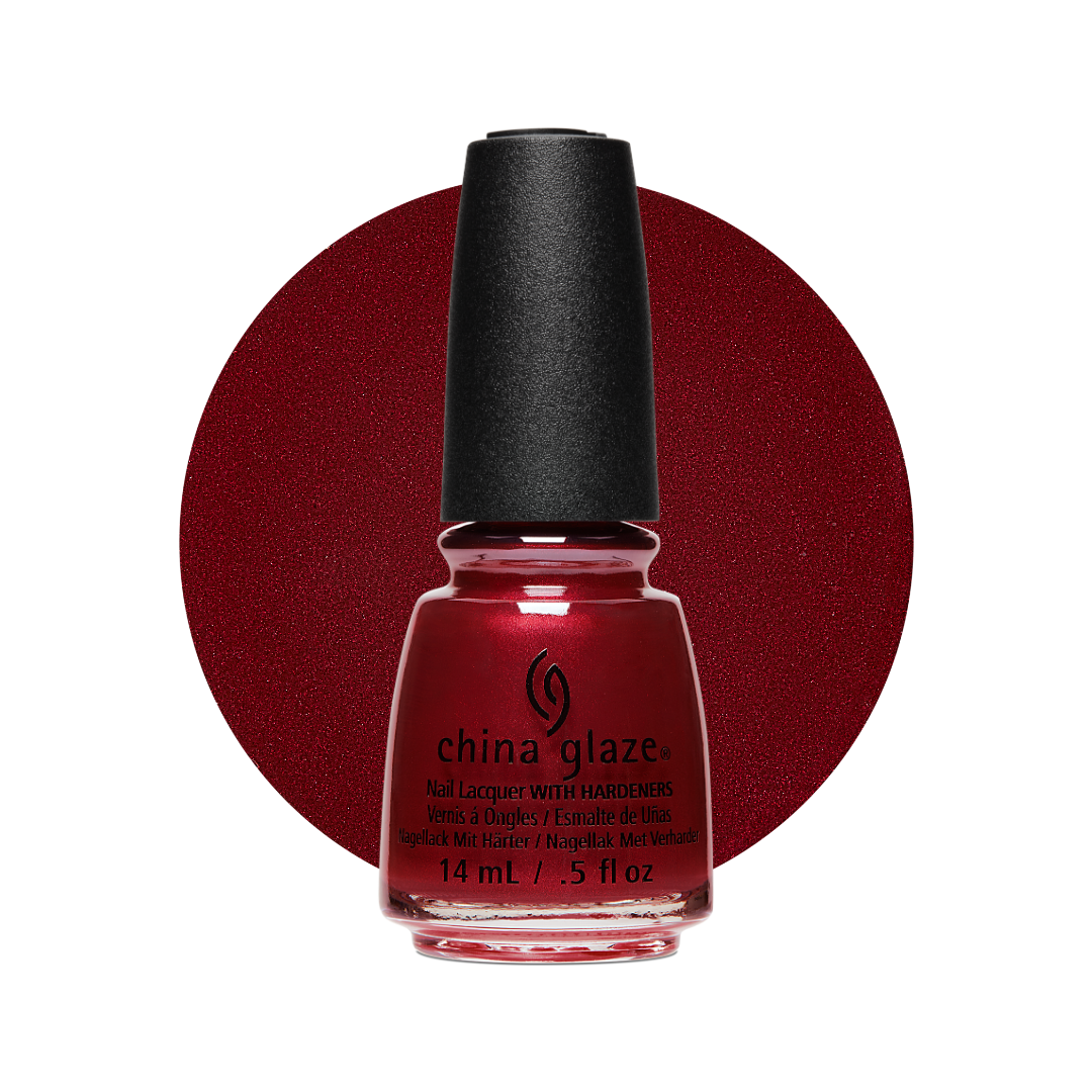 A bottle of China Glaze nail polish in a deep burgundy red shade, shown with a large matching circular swatch behind it on a white background.