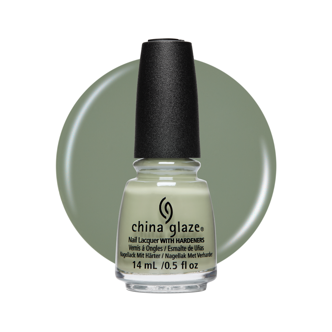 A bottle of China Glaze nail polish with a black cap, set against a large sage green circular color swatch on a white background.