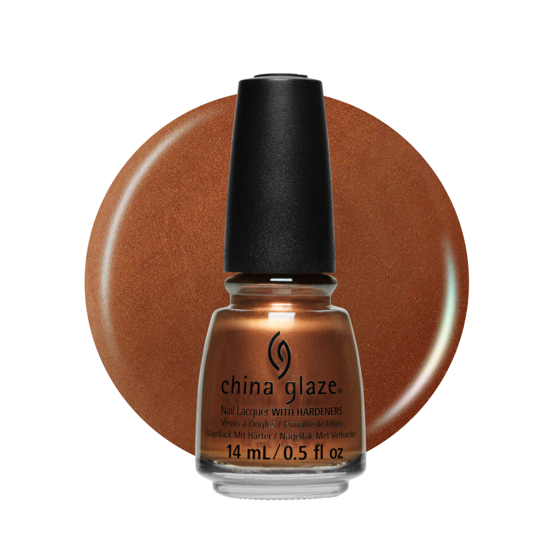 A bottle of China Glaze nail lacquer with a black cap, shown in front of a large circular swatch of the warm metallic copper-brown polish on a white background.