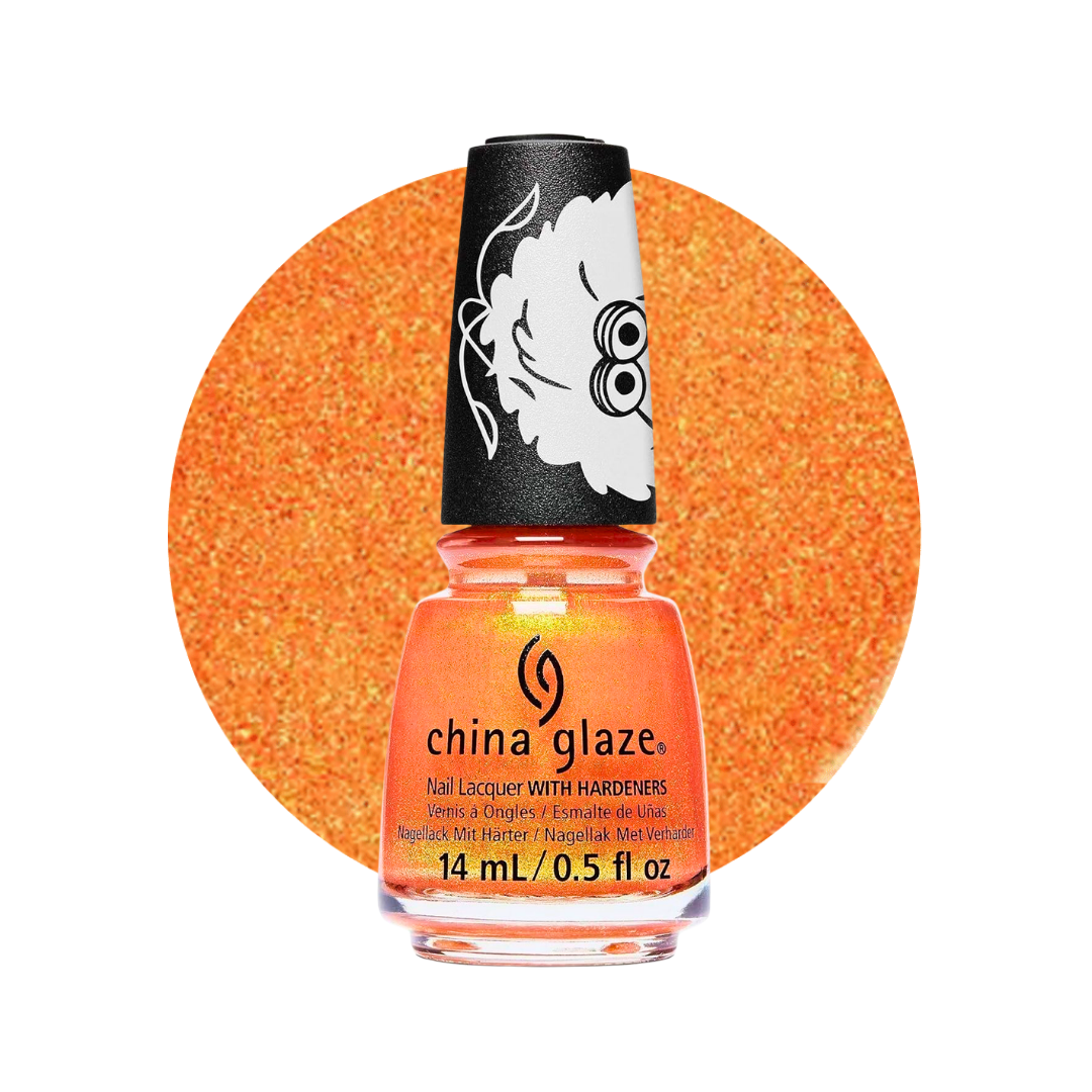 A bottle of China Glaze nail polish in a bright orange shade with subtle gold shimmer, set against a matching orange glitter circle on a white background.