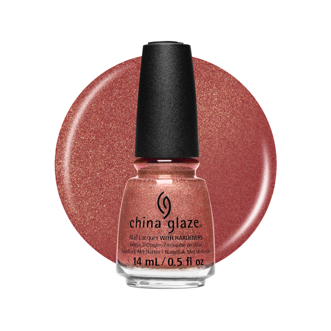 A bottle of China Glaze nail polish in a shimmering rose gold shade, shown in front of a large circular color swatch of the same glittery pinkish-rose color on a white background.
