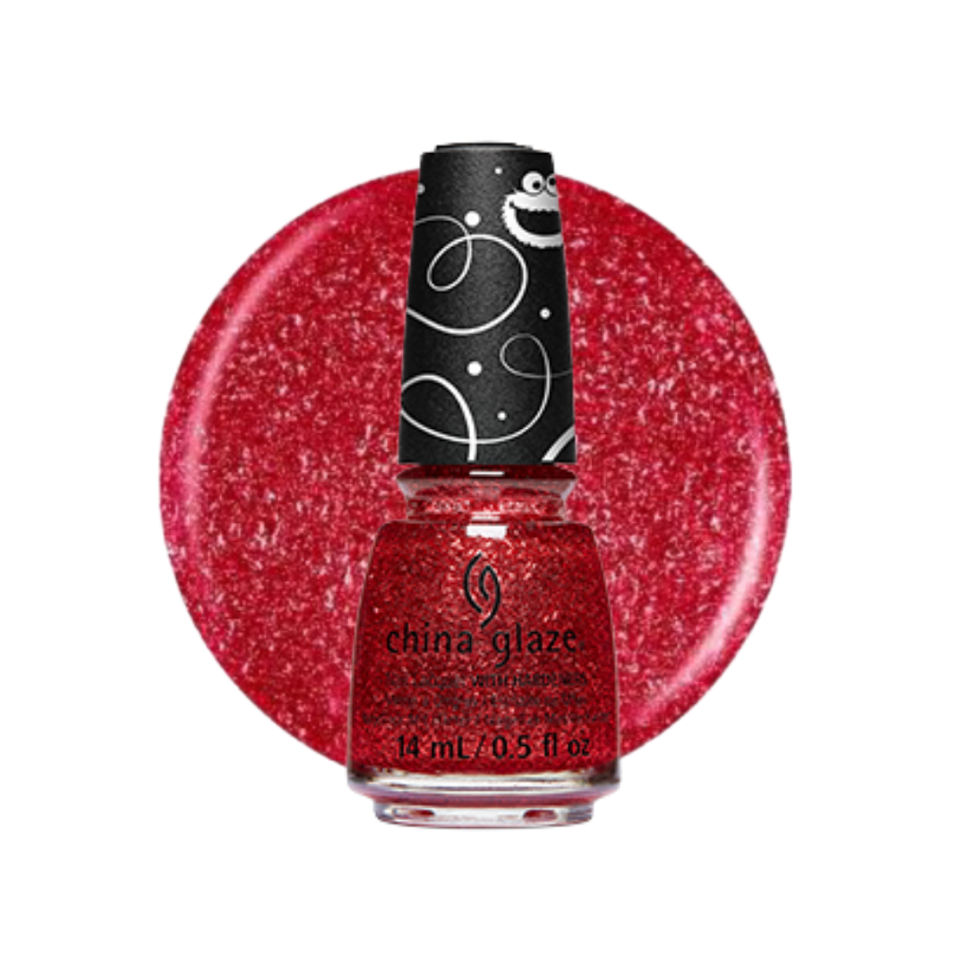 A bottle of China Glaze glitter nail polish in a vibrant red shade, set against a large circular red glitter swatch on a white background.