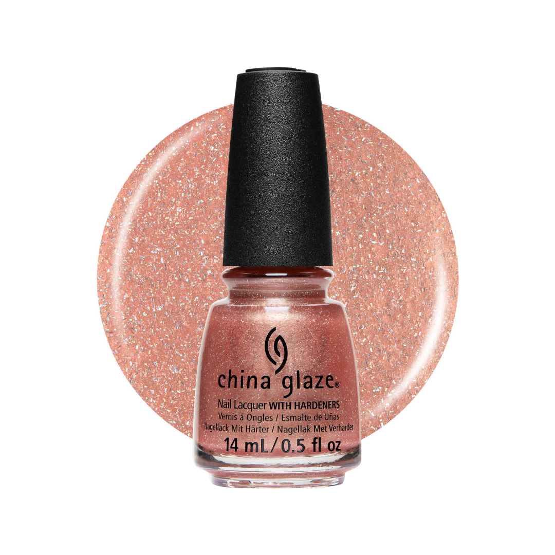 A bottle of China Glaze nail lacquer with hardeners in a sparkling rose gold shade, shown in front of a matching circular glitter swatch on a white background.