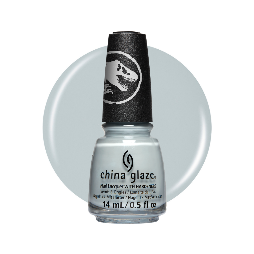 A bottle of China Glaze nail polish with a black cap featuring a white dinosaur logo, set against a pale icy blue circular color swatch on a white background.