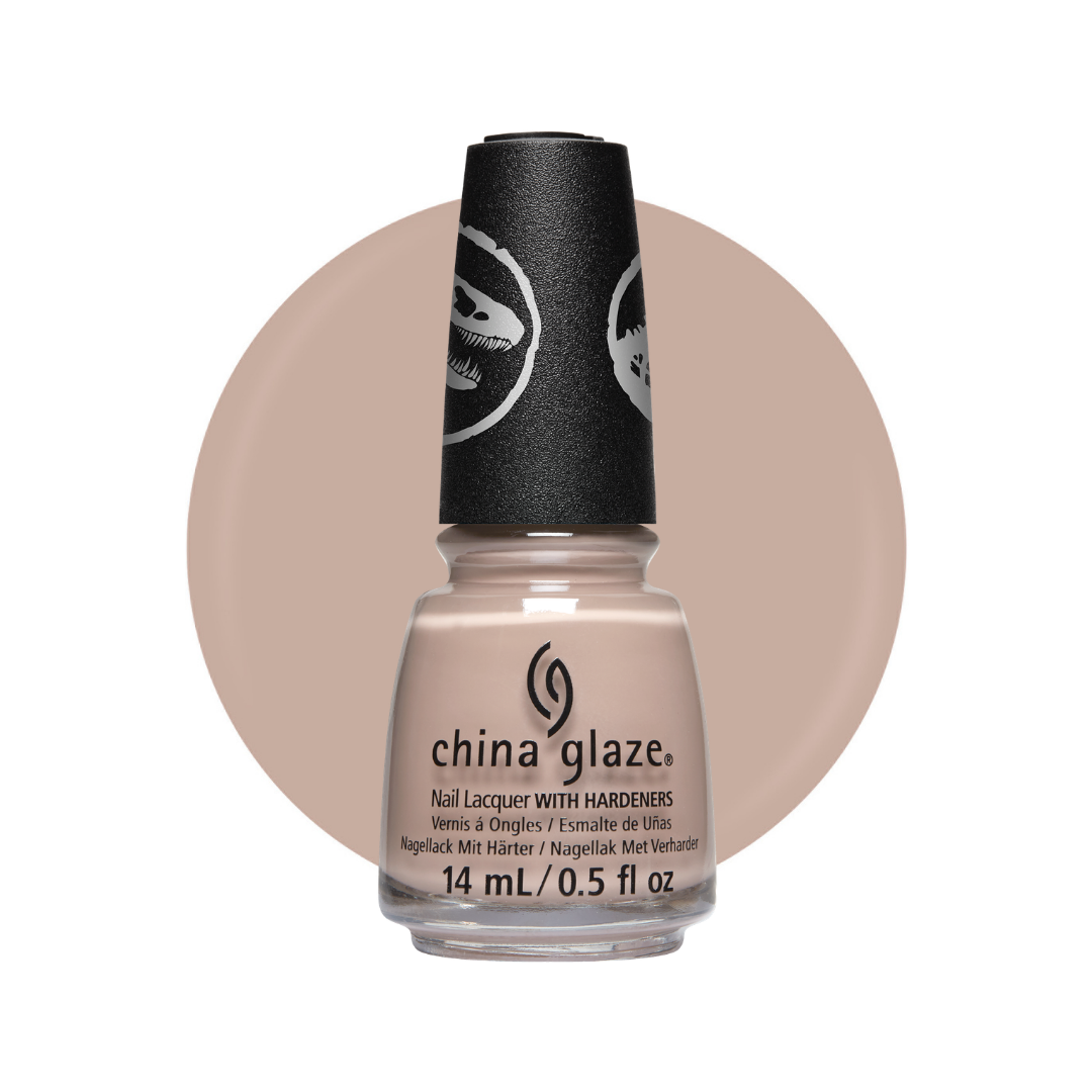 A bottle of China Glaze nail polish with a black cap, shown against a white background with a large beige circular color swatch behind it.