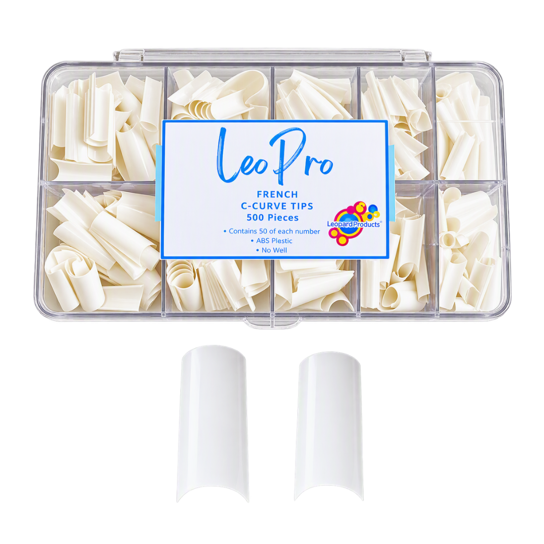 A clear plastic organizer box filled with white French C-curve nail tips, with two loose white tips displayed below on a plain white background. The center label reads 'LeoPro'.