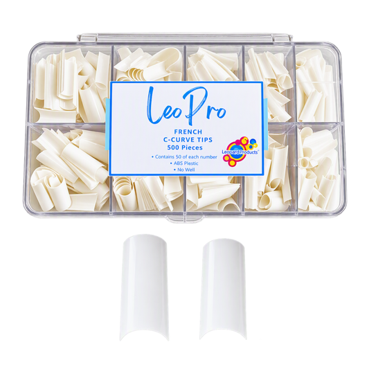 A clear plastic organizer box filled with white French C-curve nail tips, with two loose white tips displayed below on a plain white background. The center label reads 'LeoPro'.