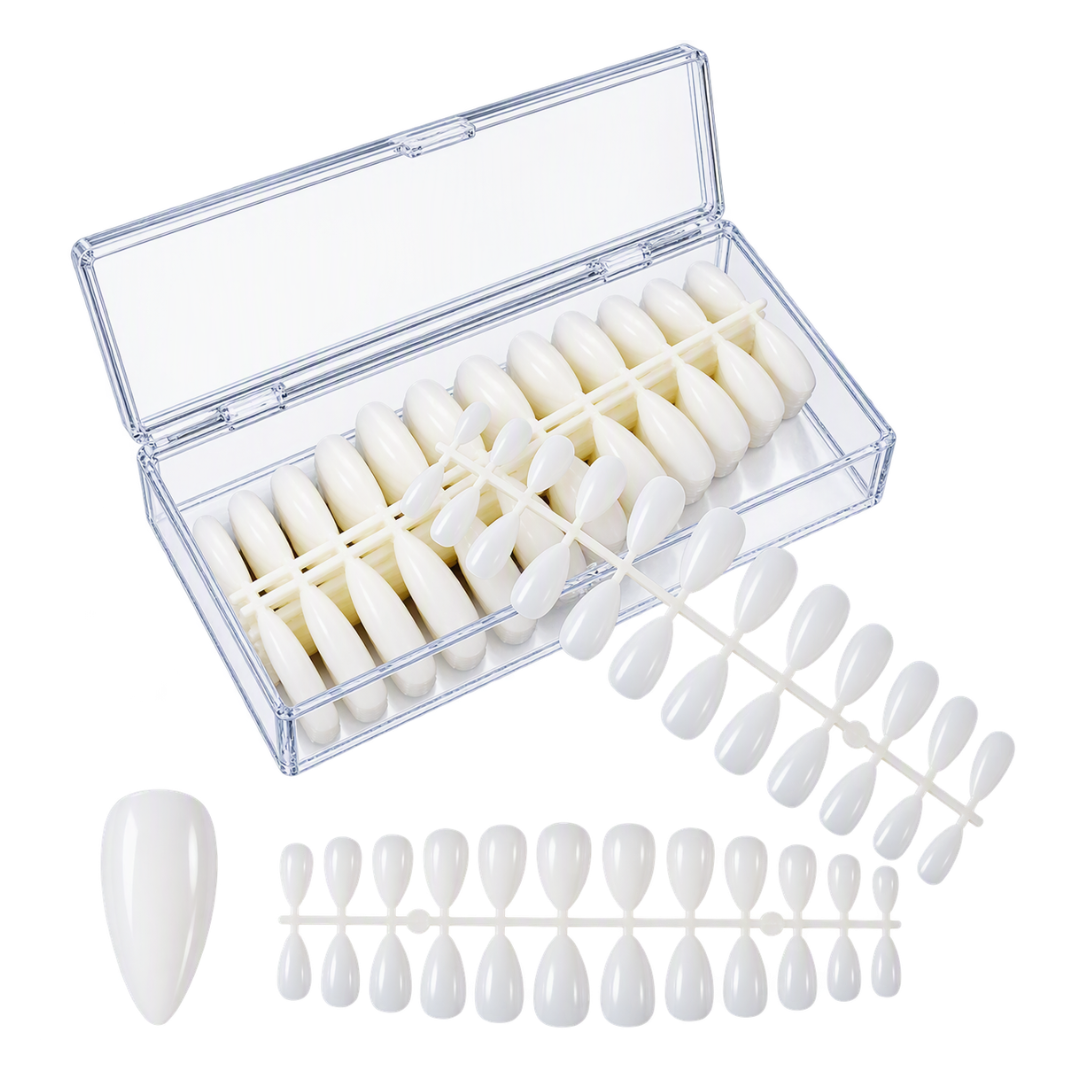 A clear plastic nail display tray containing multiple white artificial nail tips, shown open on a white background with additional loose nail tips arranged in front.