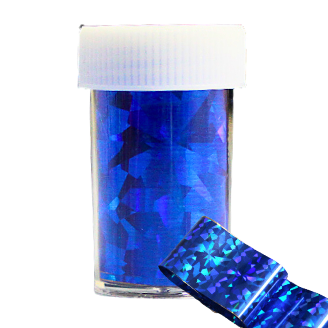 A clear plastic jar filled with bright blue holographic nail art foil, shown with a white screw-top lid and a loose strip of the blue reflective flakes in the foreground on a white background.