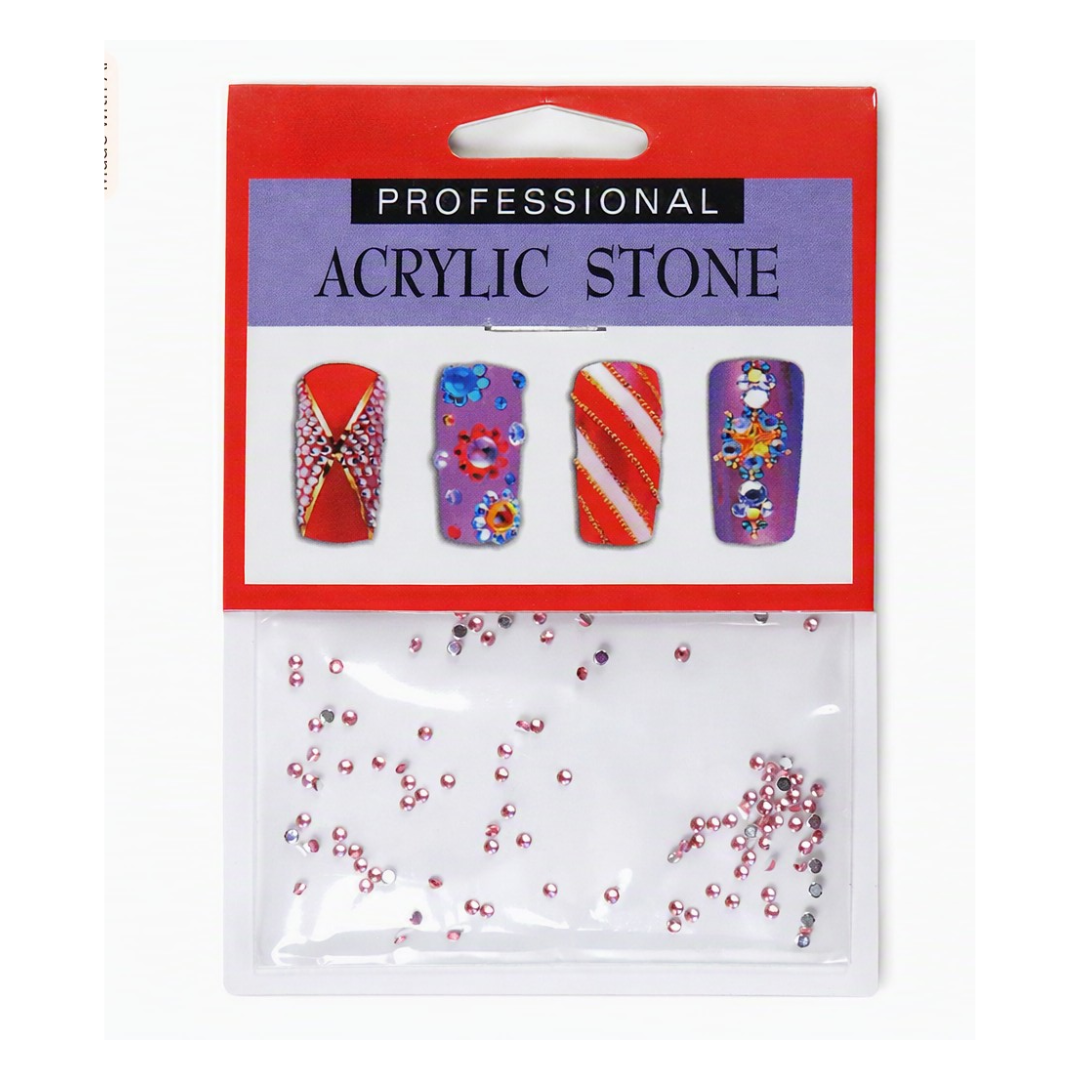 A package of professional acrylic nail stones in a clear plastic bag with a red and purple header card. The header card displays four decorated nail tips showcasing the pink, silver, and multicolor rhinestones.